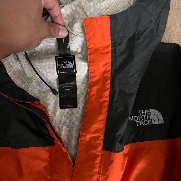 ORANGE NORTHFACE RAIN JACKET - Picture 2 of 3